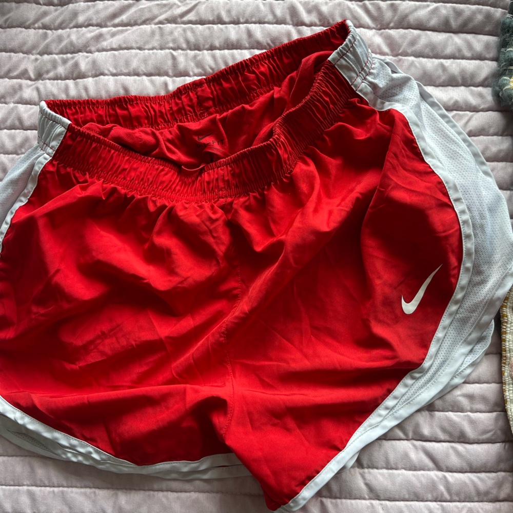 Nike red running shorts